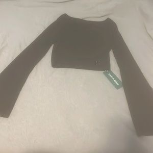 Flared black long sleeve shirt. XS in women’s